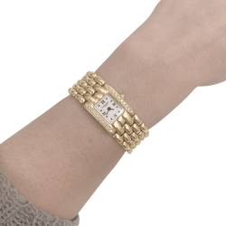 Montre CHAUMET "Khesis" en or jaune, or rose, quartz et diamants. - Castafiore