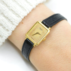 Montre CHOPARD en or jaune, cuir et quartz - Castafiore