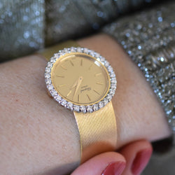Montre CHOPARD en or jaune et diamants - Castafiore