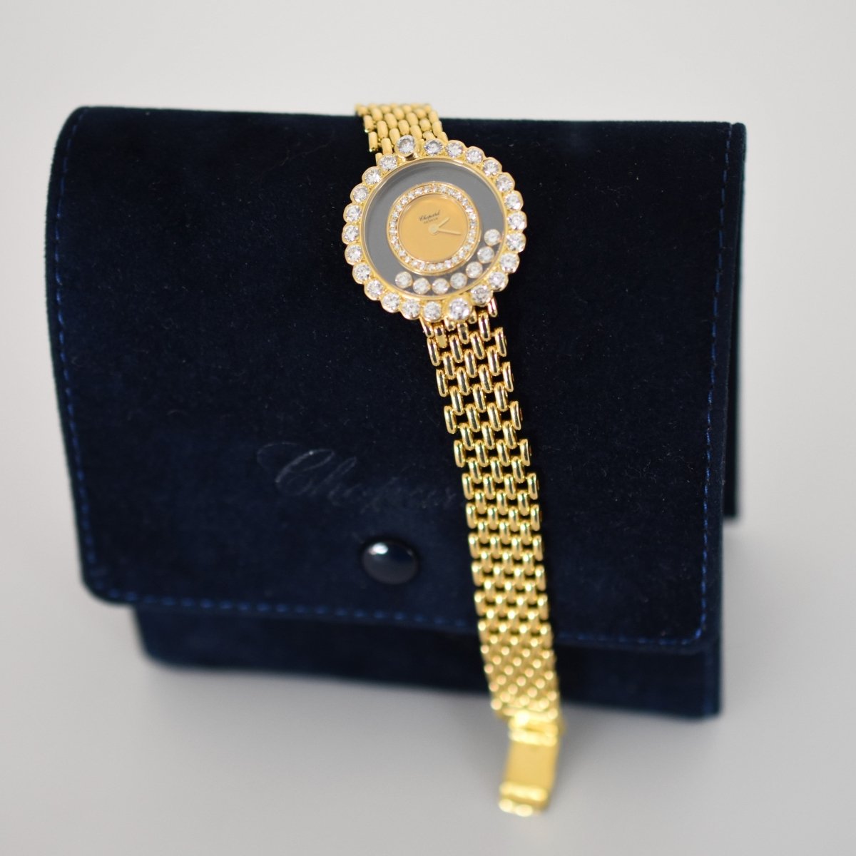 Montre CHOPARD "Happy Diamonds" en or jaune et diamants - Castafiore