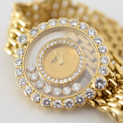 Montre CHOPARD "Happy Diamonds" en or jaune et diamants - Castafiore