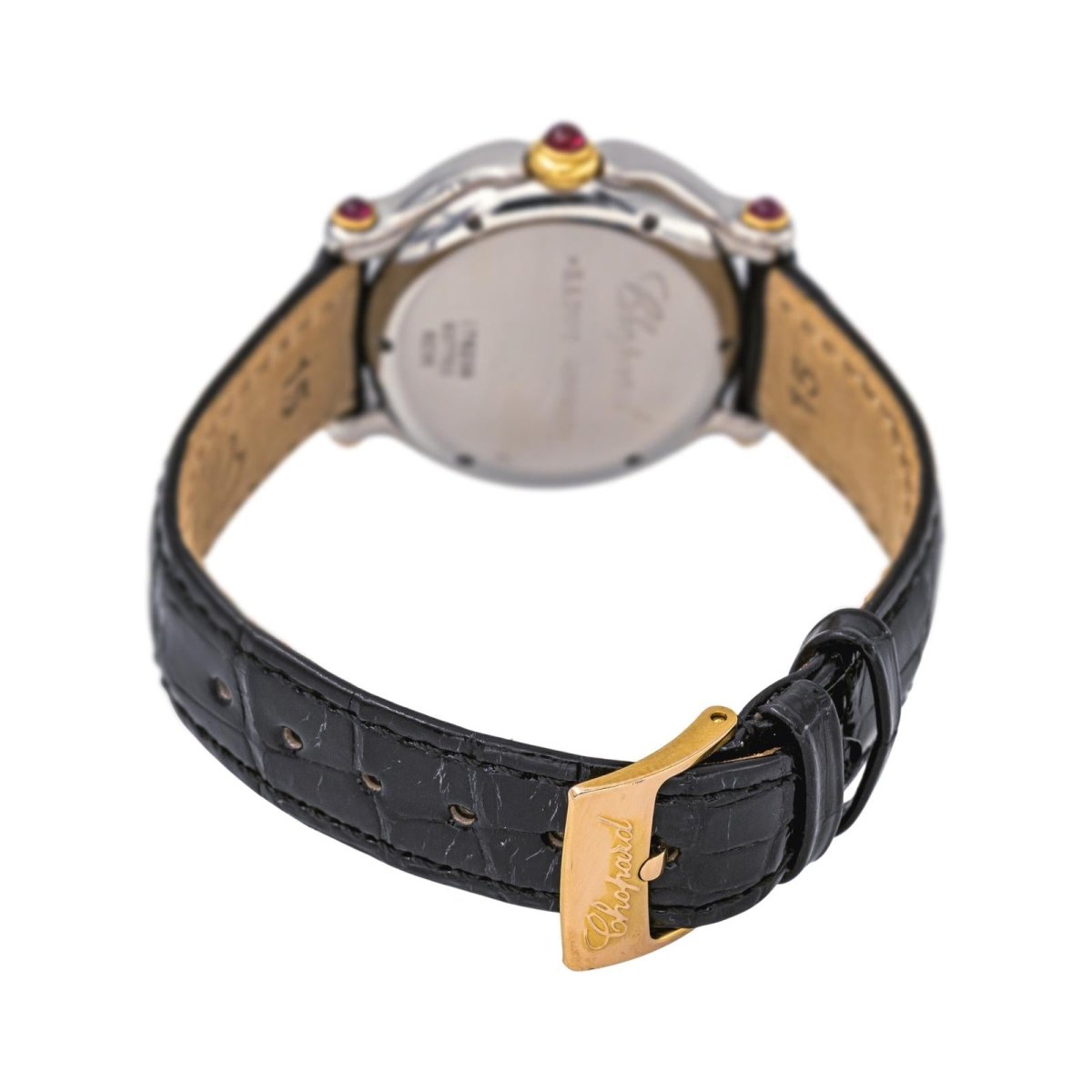 Montre CHOPARD "Happy Sport" en or jaune, acier, nacre, cuir, rubis, émeraudes, saphir et diamants - Castafiore