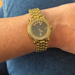Montre CHOPARD Happy Sport en or jaune et diamants - Castafiore