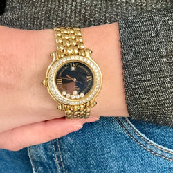 Montre CHOPARD "Happy Sport" en or jaune, saphirs, quartz et diamants - Castafiore
