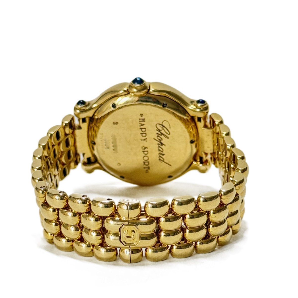 Montre CHOPARD "Happy Sport" en or jaune, saphirs, quartz et diamants - Castafiore