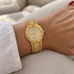 Montre CORUM "Romvlvs" en or jaune - Castafiore