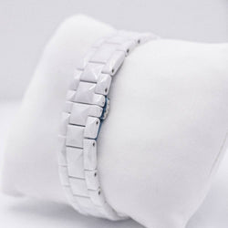 Montre DIOR en acier, céramique et diamants - Castafiore