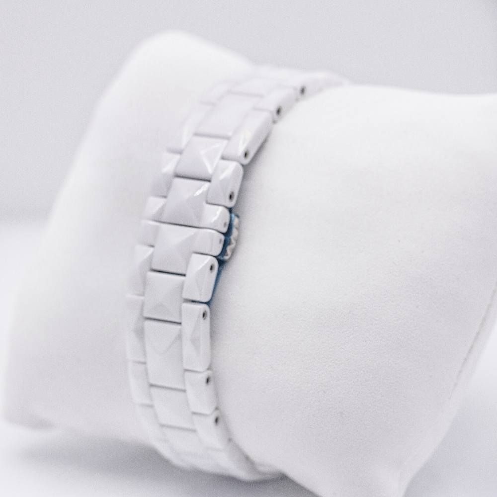 Montre DIOR en acier, céramique et diamants - Castafiore