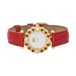 Montre FRED "Concerto" en or jaune, rubis, cuir, quartz et diamants - Castafiore