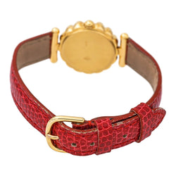 Montre FRED "Concerto" en or jaune, rubis, cuir, quartz et diamants - Castafiore