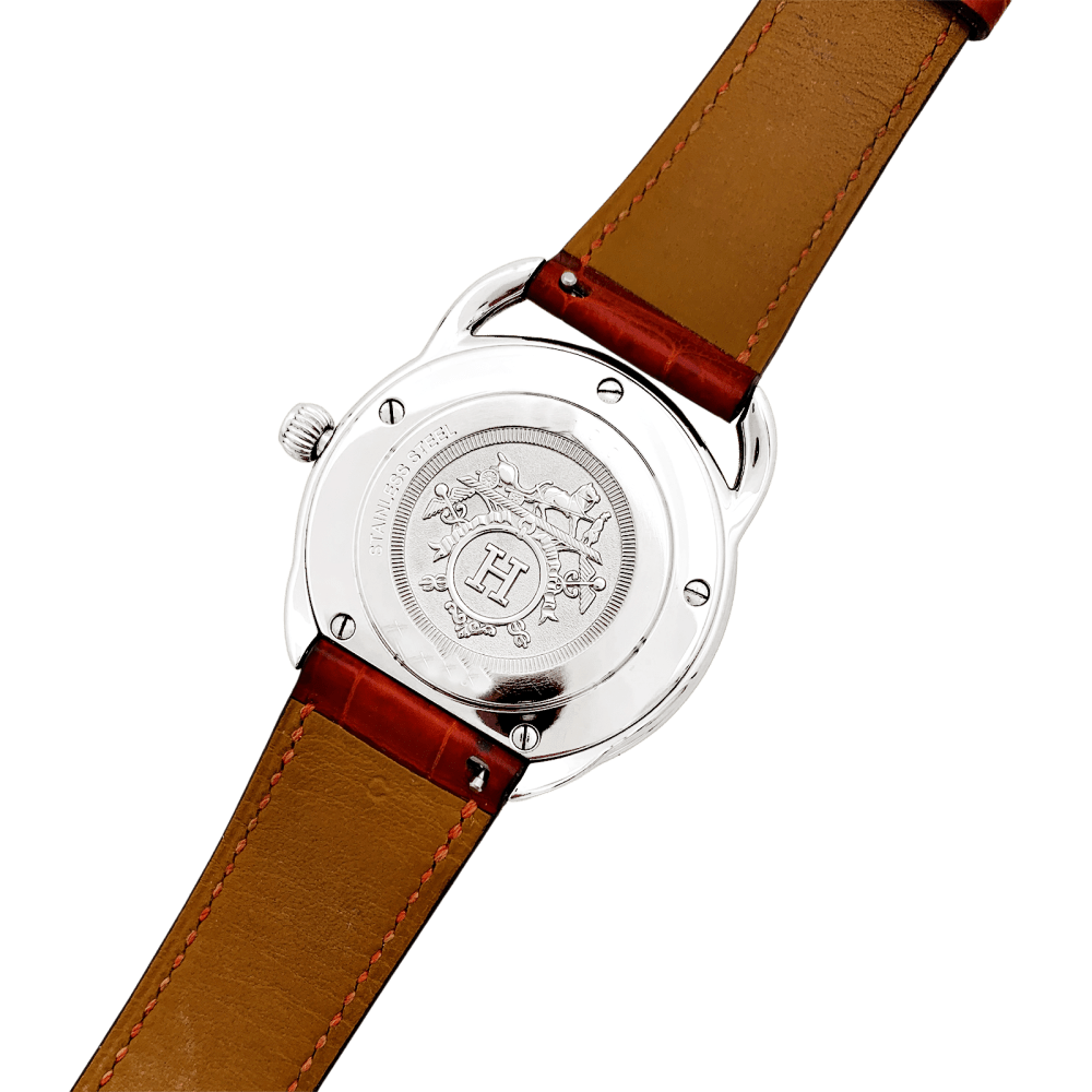 Montre HERMÈS "Arceau" en acier, cuir, nacre et diamants - Castafiore