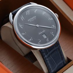 Montre HERMÈS "Arceau" en acier et cuir - Castafiore