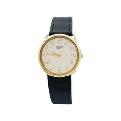 Montre HERMÈS "Arceau" en acier et cuir - Castafiore