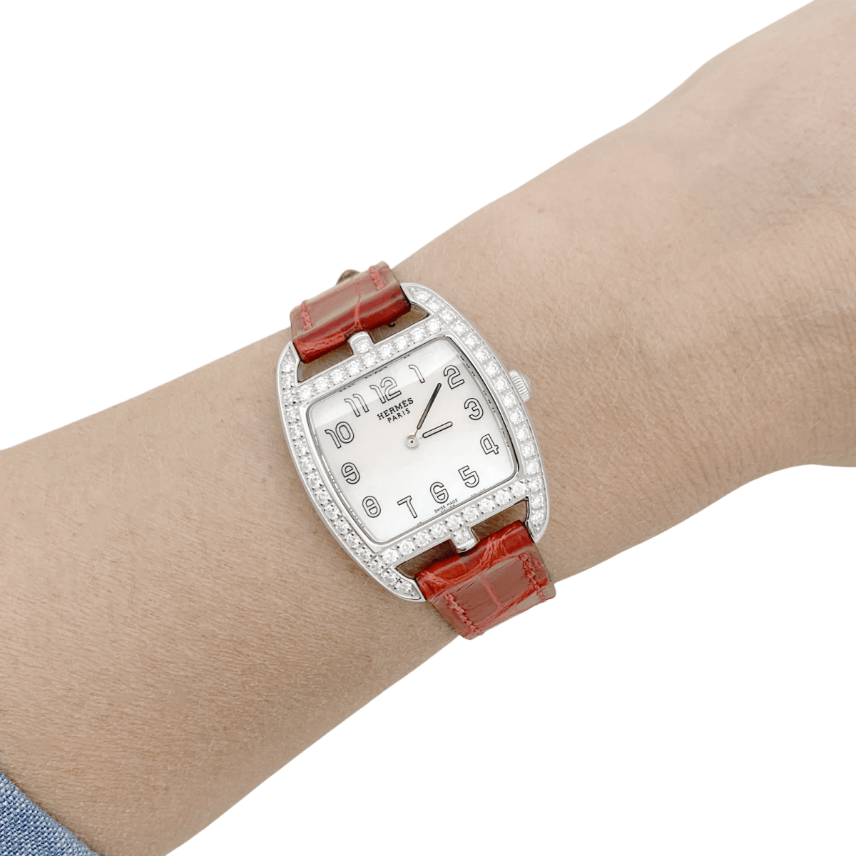 Montre Hermès, "Cape Cod Tonneau", en acier et diamants sur cuir. - Castafiore