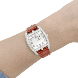 Montre Hermès, "Cape Cod Tonneau", en acier et diamants sur cuir. - Castafiore