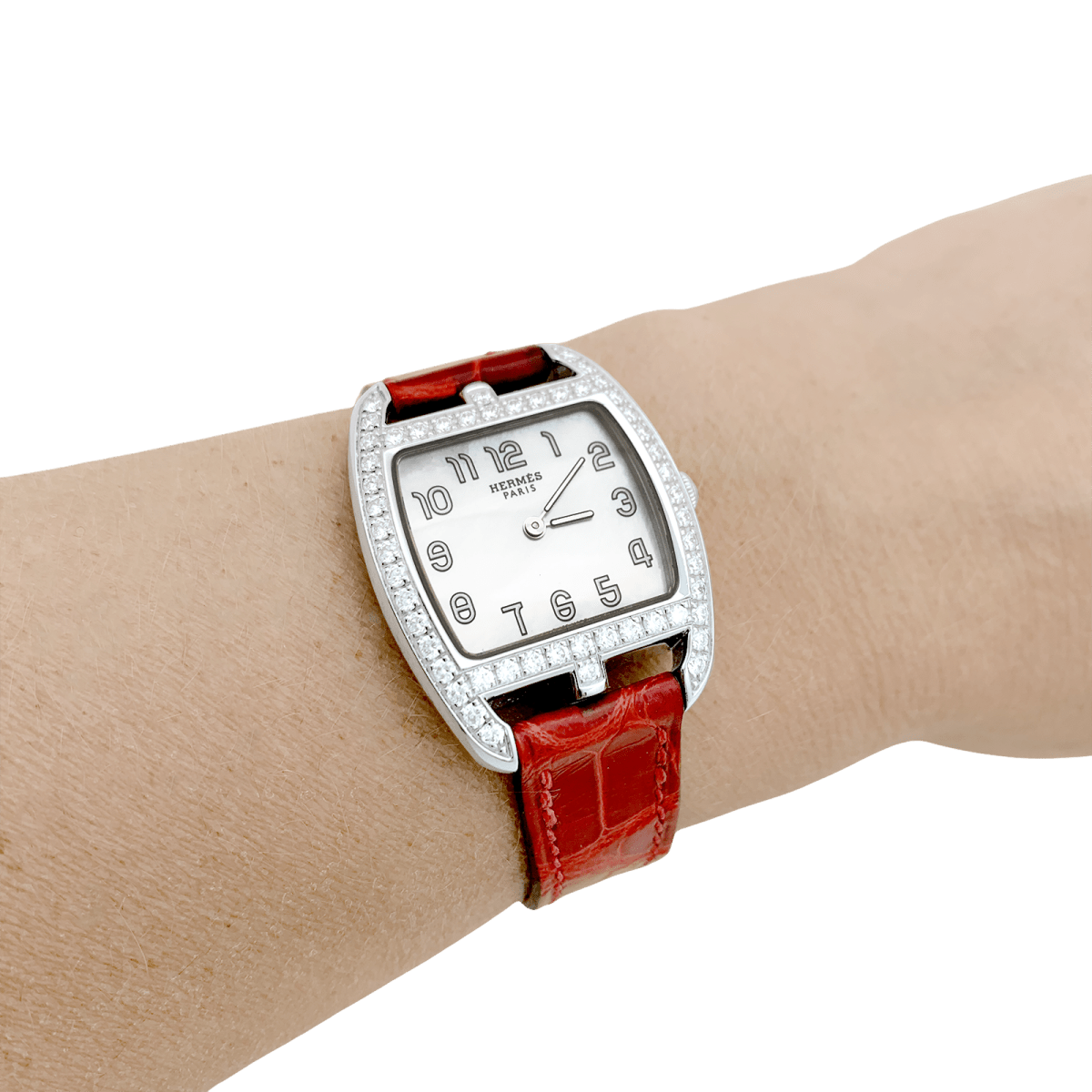 Montre Hermès, "Cape Cod Tonneau", en acier et diamants sur cuir. - Castafiore