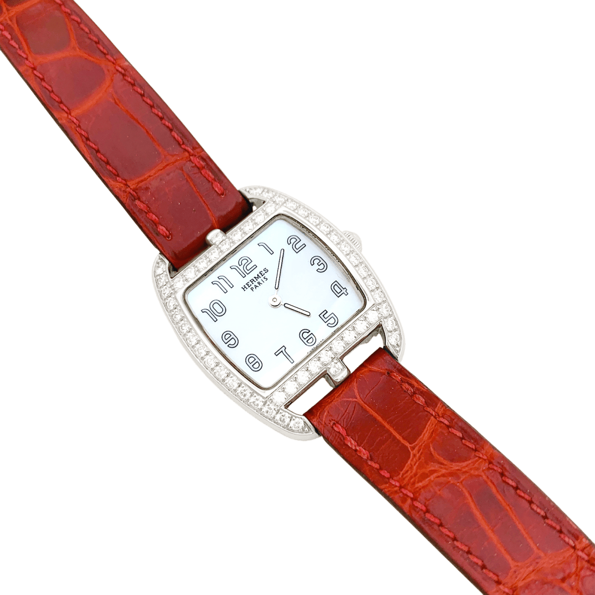 Montre Hermès, "Cape Cod Tonneau", en acier et diamants sur cuir. - Castafiore