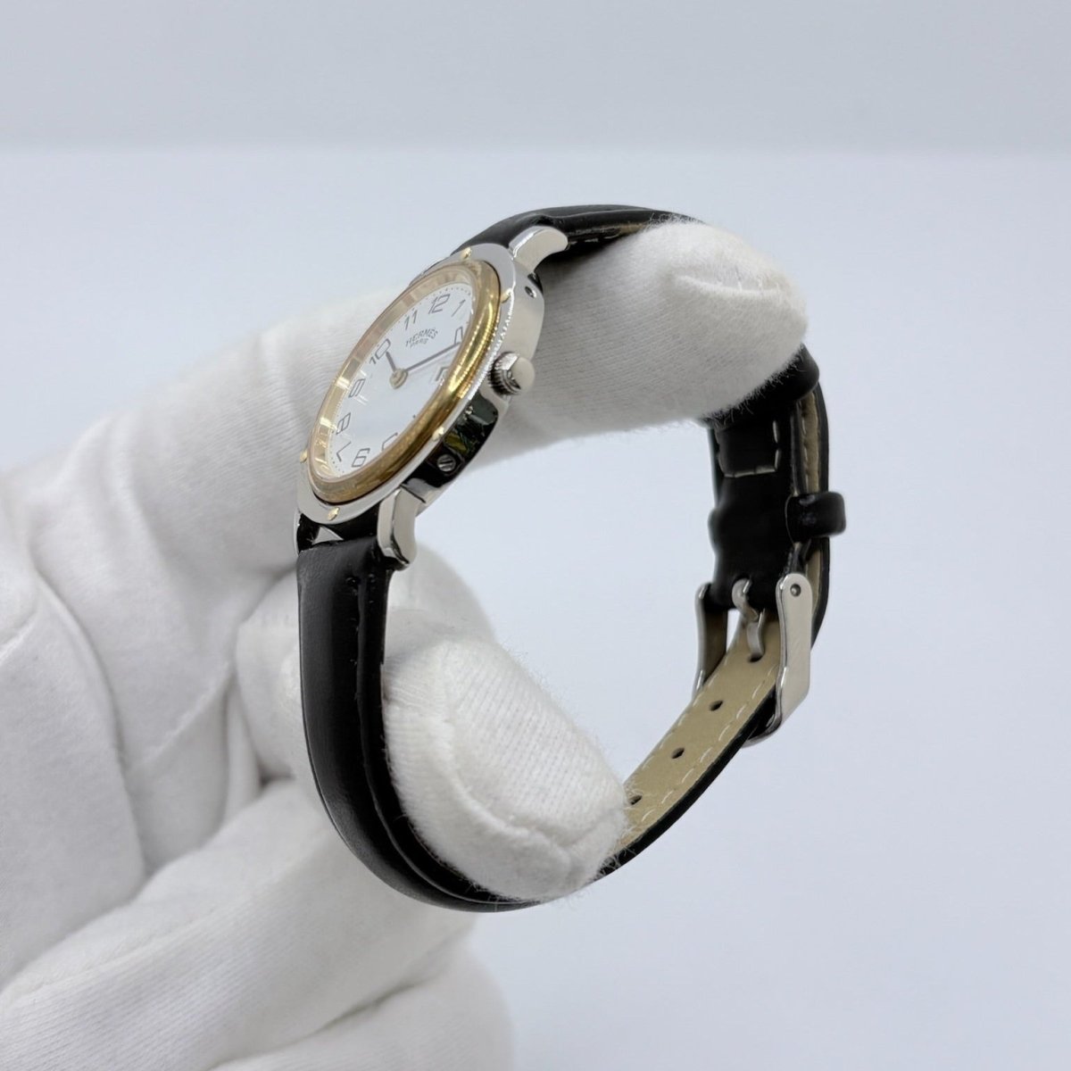 Montre HERMÈS "Clipper" en or jaune, acier et cuir - Castafiore