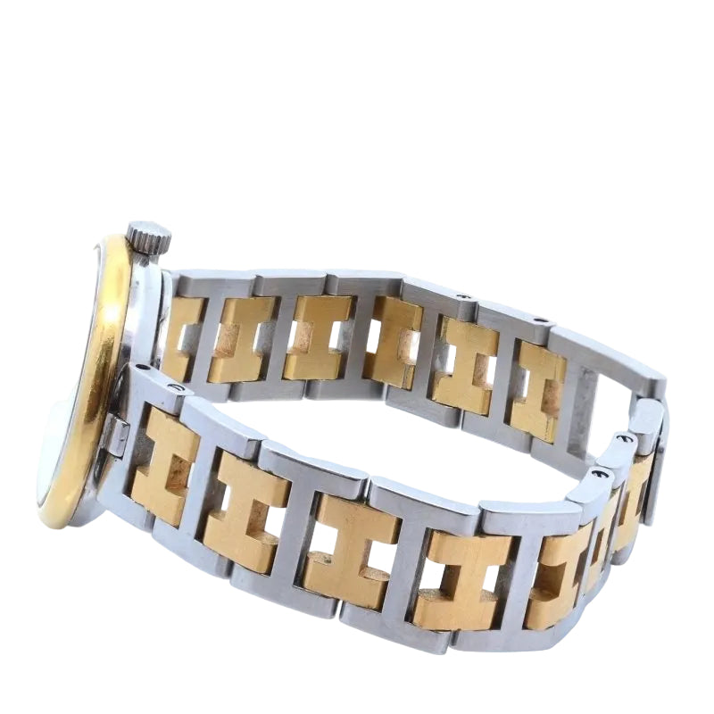 Montre HERMÈS en acier et plaqué or - Castafiore