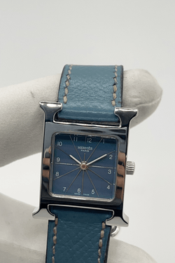 Montre HERMÈS "Heure H" en acier et cuir - Castafiore