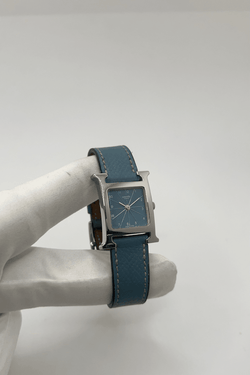 Montre HERMÈS "Heure H" en acier et cuir - Castafiore