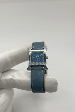 Montre HERMÈS "Heure H" en acier et cuir - Castafiore