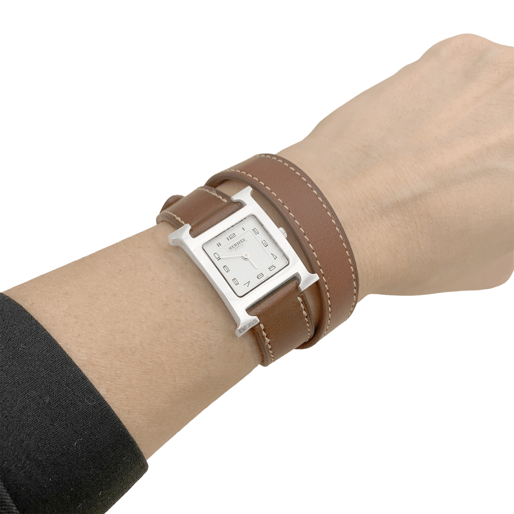 Montre HERMÈS "Heure H" en acier et cuir - Castafiore