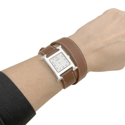 Montre HERMÈS "Heure H" en acier et cuir - Castafiore