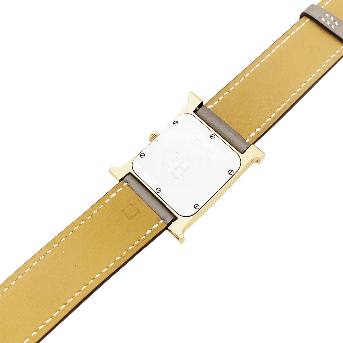 Montre HERMÈS "Heure H" en plaqué or, acier et cuir - Castafiore