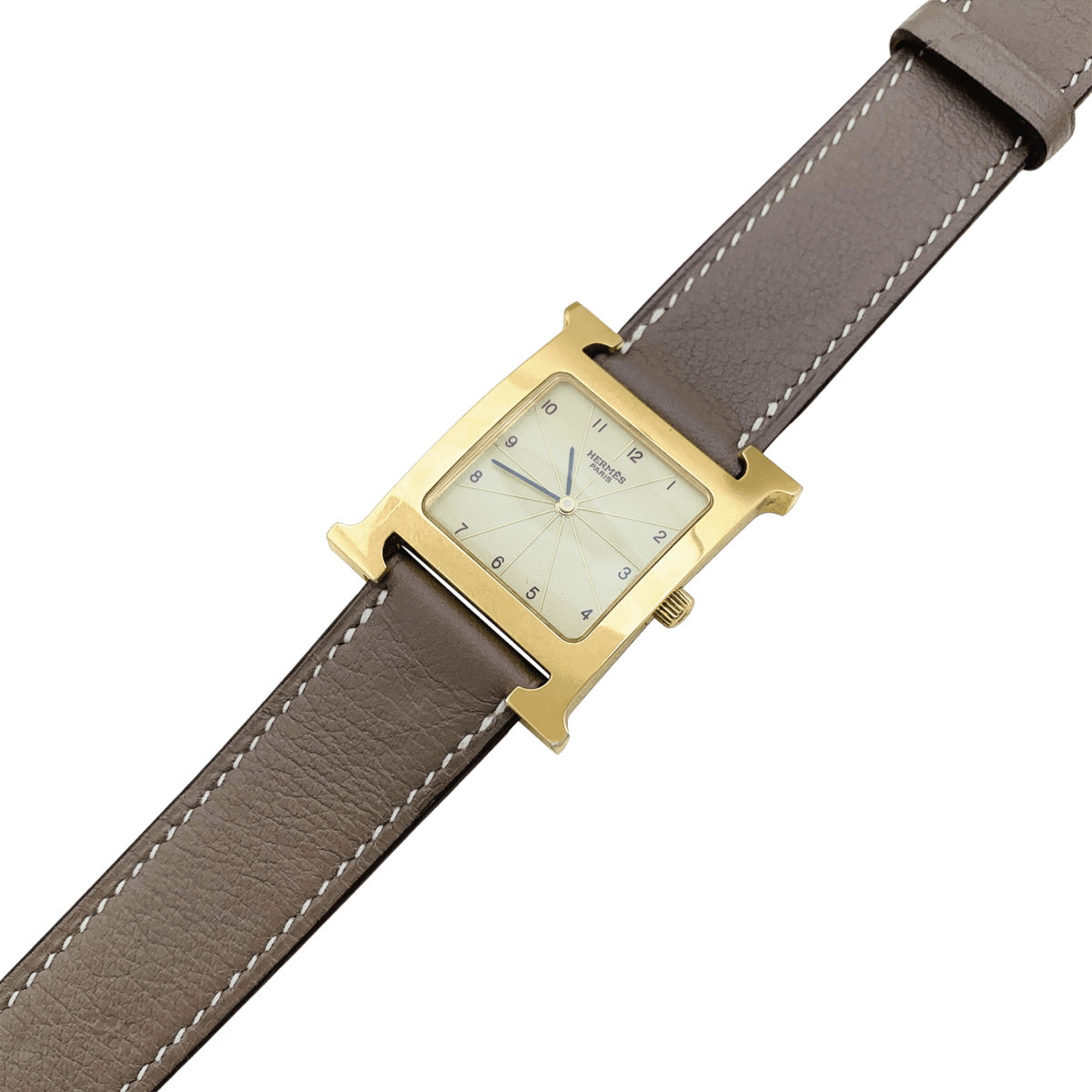 Montre HERMÈS "Heure H" en plaqué or, acier et cuir - Castafiore