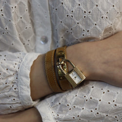 Montre HERMÈS "Kelly" en métal, cuir et quartz - Castafiore