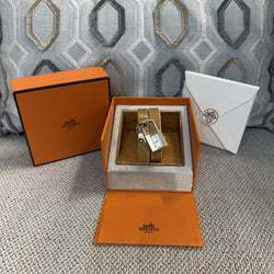 Montre HERMÈS "Kelly" en métal, cuir et quartz - Castafiore