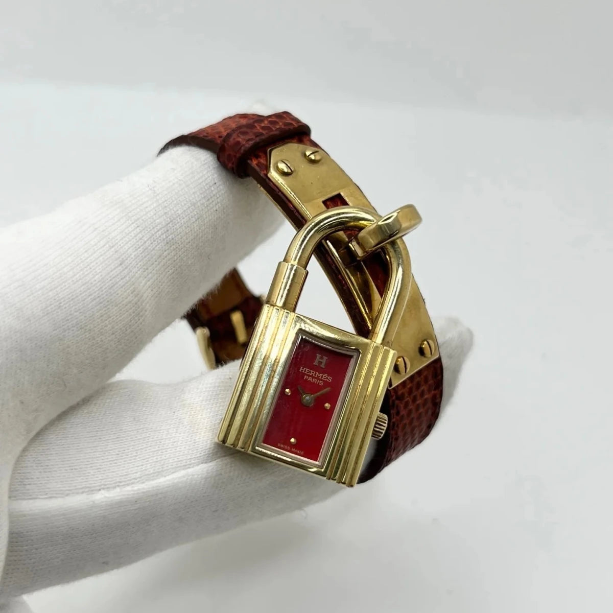 Montre HERMÈS "Kelly" plaqué or, acier et cuir - Castafiore