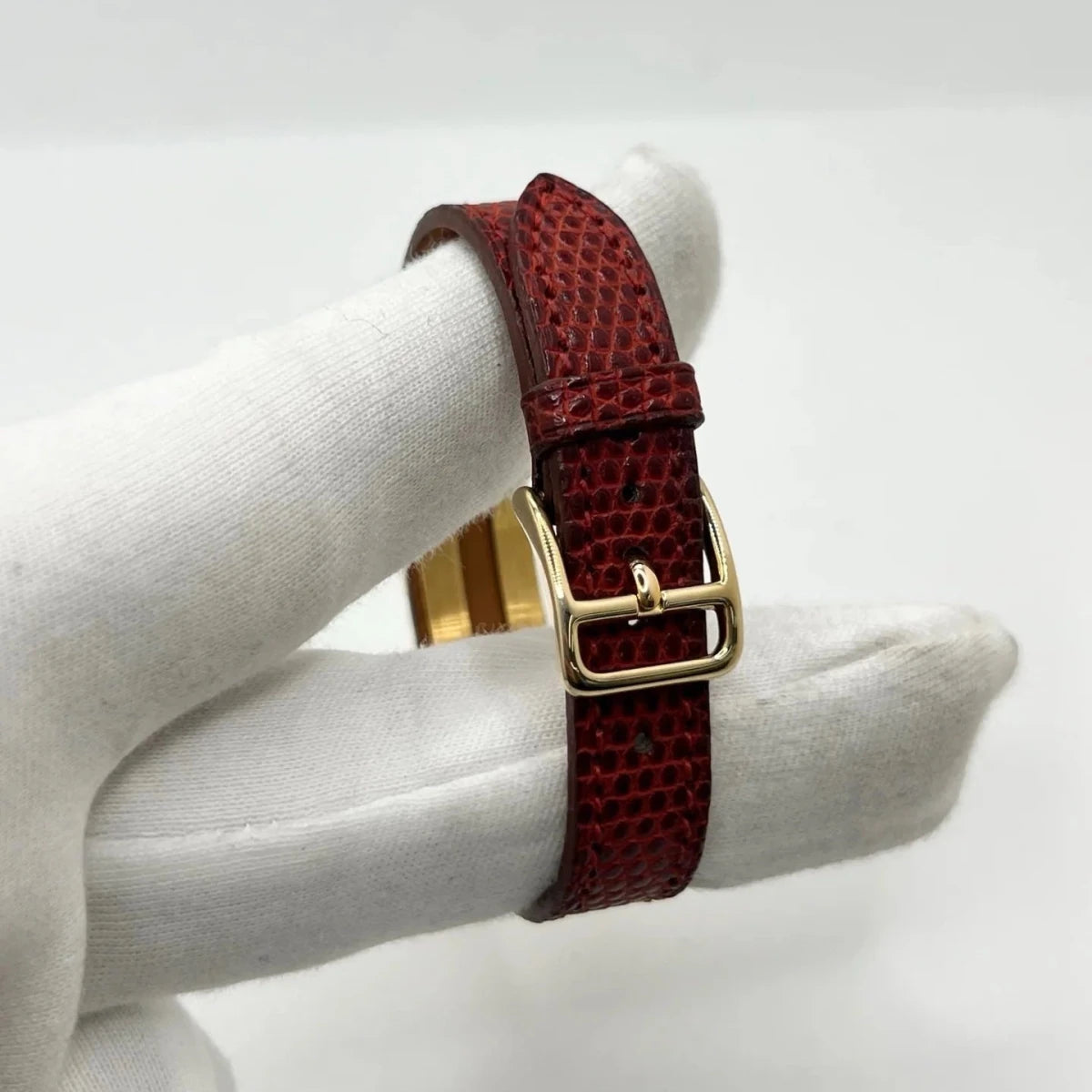 Montre HERMÈS "Kelly" plaqué or, acier et cuir - Castafiore