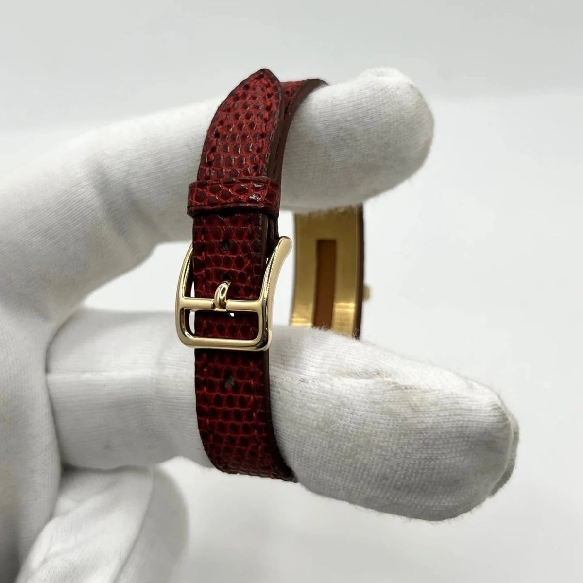 Montre HERMÈS "Kelly" plaqué or, acier et cuir - Castafiore