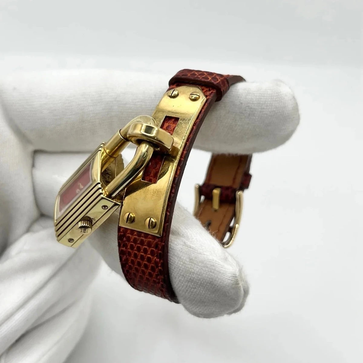 Montre HERMÈS "Kelly" plaqué or, acier et cuir - Castafiore