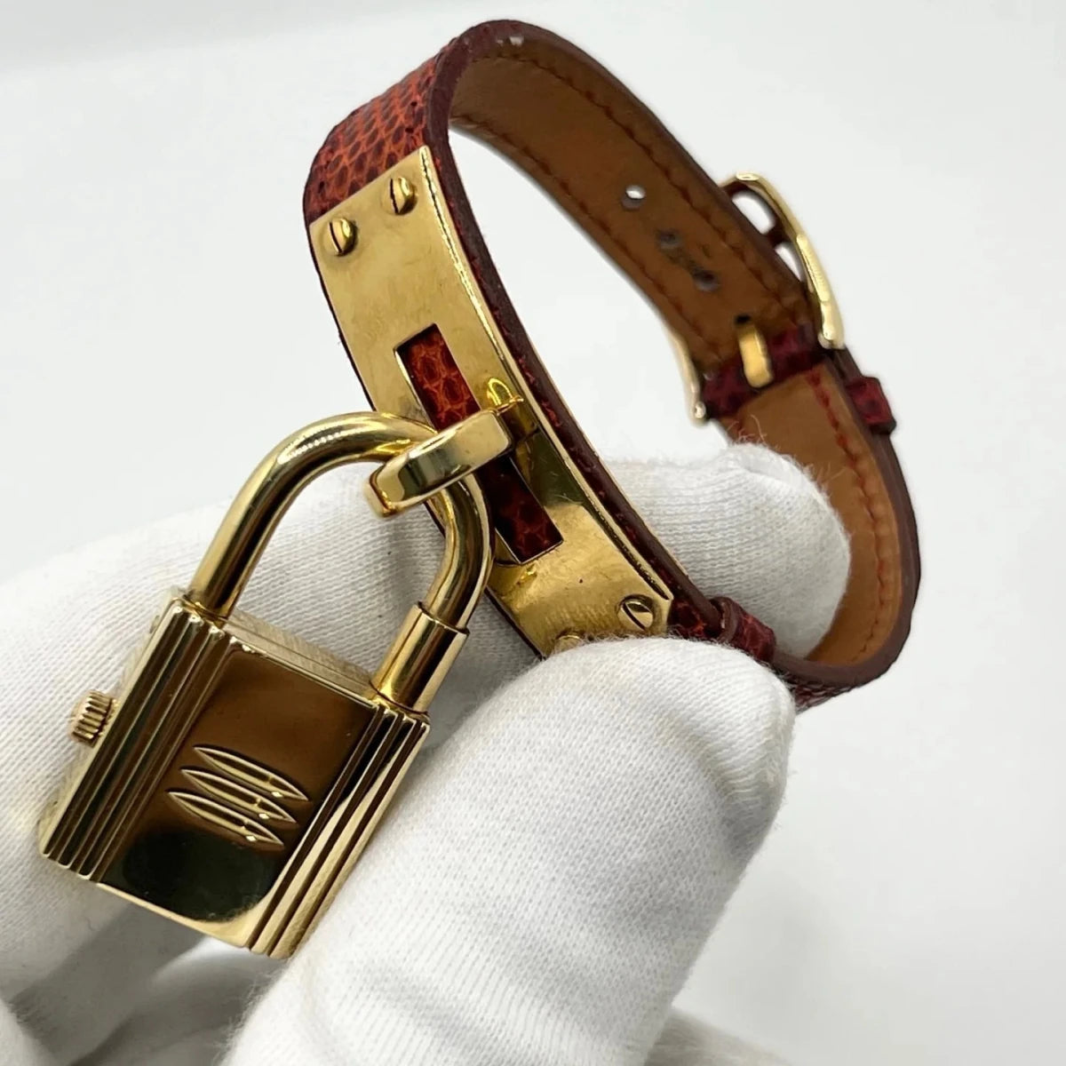 Montre HERMÈS "Kelly" plaqué or, acier et cuir - Castafiore