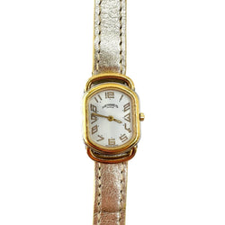 Montre HERMÈS, "Rallye" en or jaune et acier - Castafiore