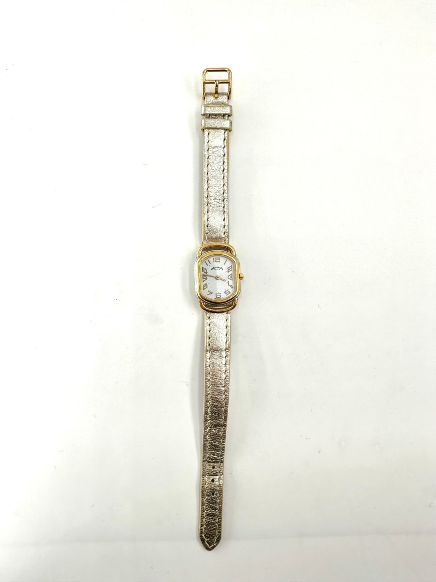 Montre HERMÈS, "Rallye" en or jaune et acier - Castafiore