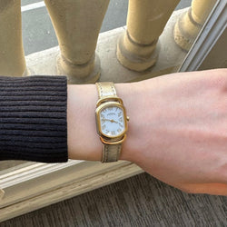 Montre HERMÈS, "Rallye" en or jaune et acier - Castafiore