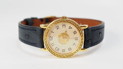 Montre Hermès Sellier en or jaune - Castafiore