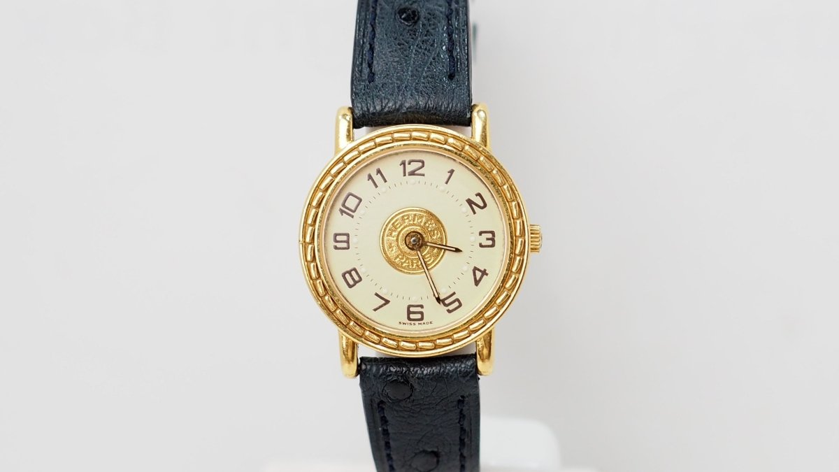 Montre Hermès Sellier en or jaune - Castafiore