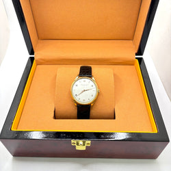 Montre IWC en or jaune, acier et cuir - Castafiore