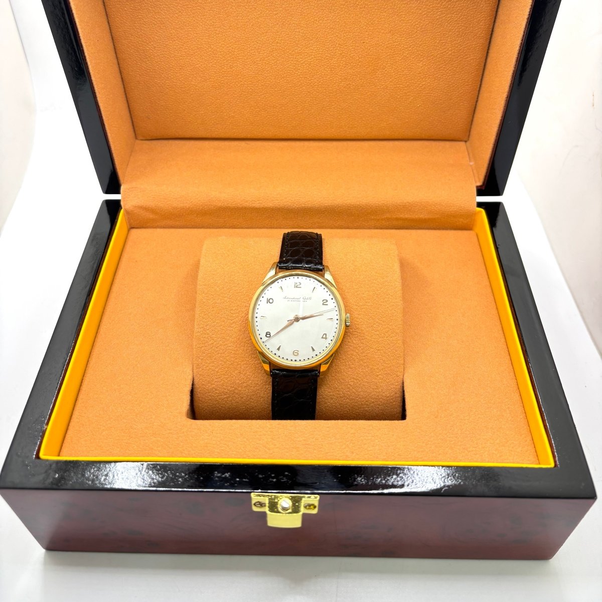 Montre IWC en or jaune, acier et cuir - Castafiore