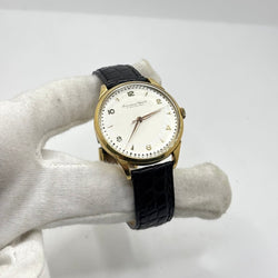 Montre IWC en or jaune, acier et cuir - Castafiore