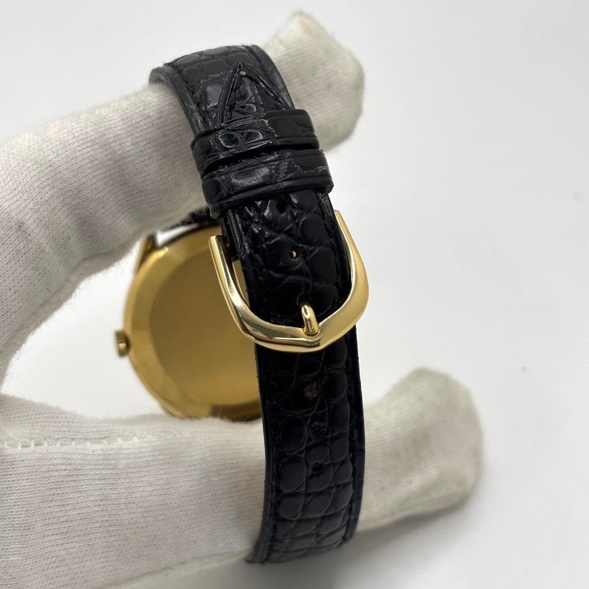 Montre IWC en or jaune, acier et cuir - Castafiore
