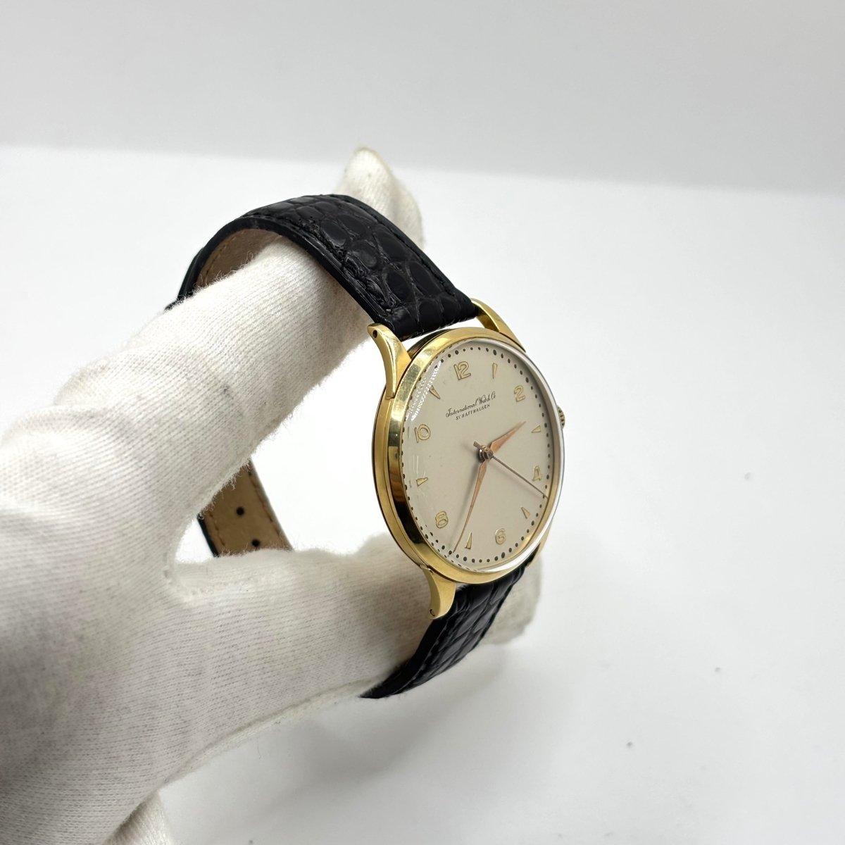 Montre IWC en or jaune, acier et cuir - Castafiore