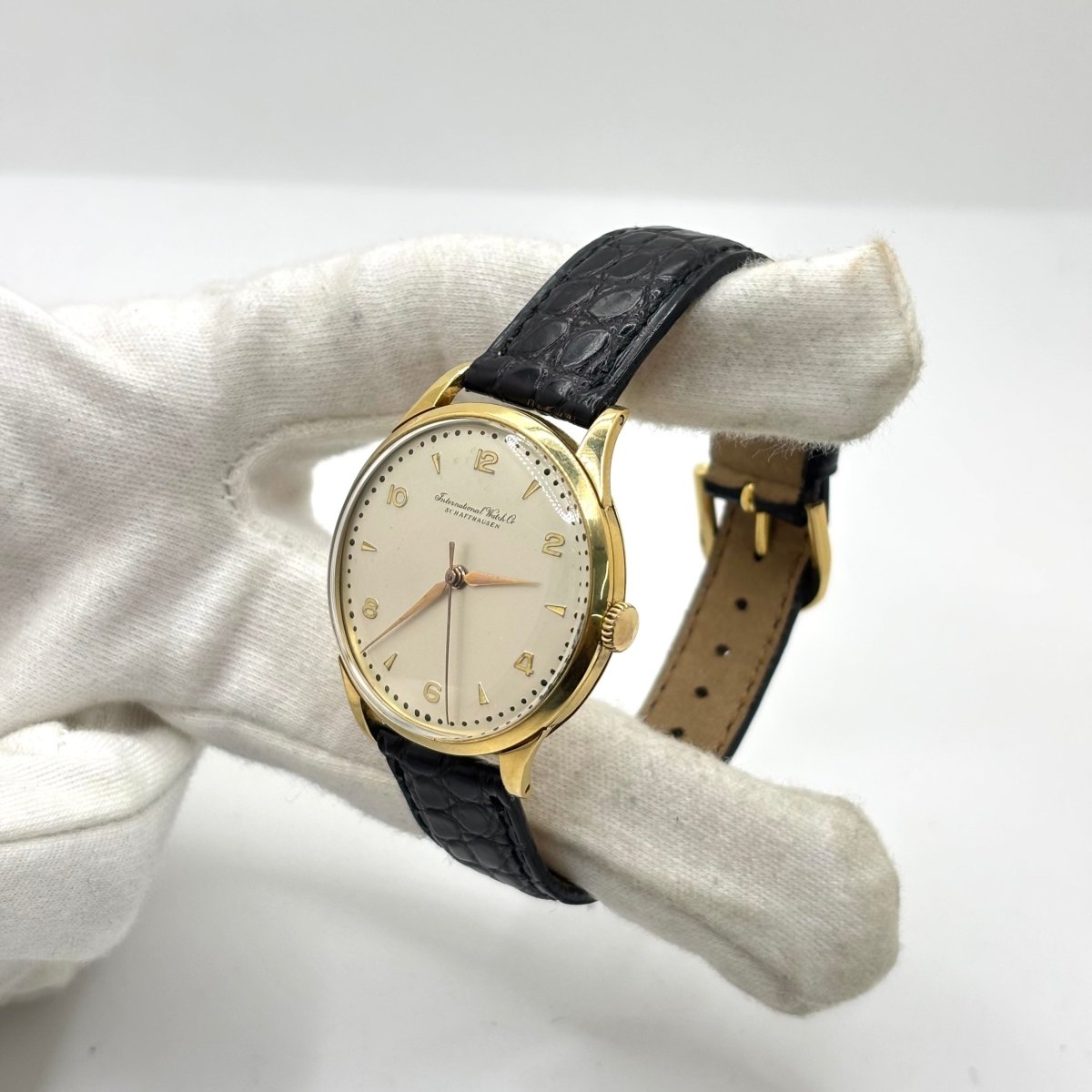 Montre IWC en or jaune, acier et cuir - Castafiore
