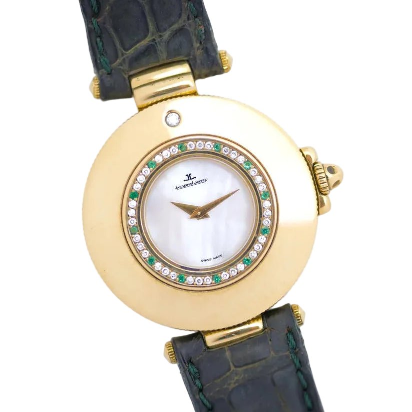 Montre JAEGER-LECOULTRE en or jaune, nacre, cuir, émeraudes et diamants - Castafiore