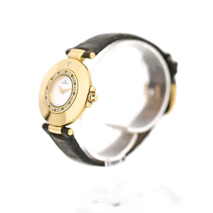 Montre JAEGER-LECOULTRE en or jaune, nacre, cuir, émeraudes et diamants - Castafiore